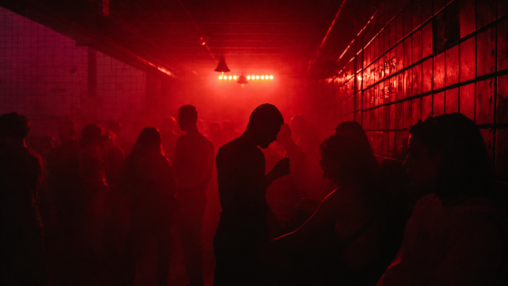 Red-lit underground music room